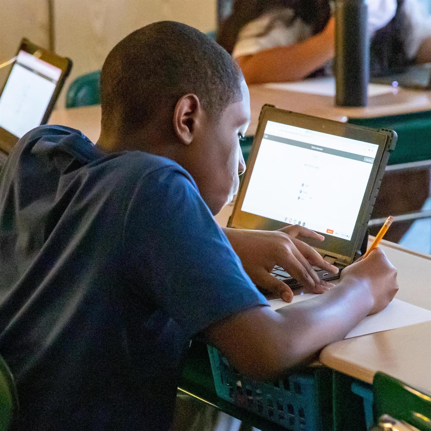 Elementary student taking their end of grade assessment test